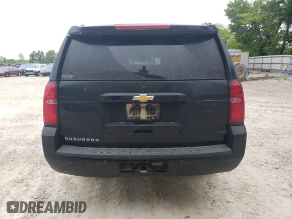 2018 Chevrolet Suburban LT with VIN 1GNSCHKC8JR331662, listed as a Copart auction lot 55561545 with 164,213 mi miles and Salvage title. Bid and sale history available at DreamBid. Image 6.