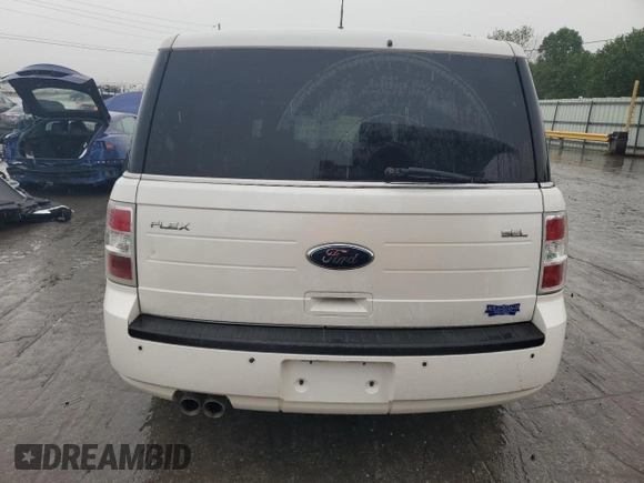 2009 Ford Flex SEL z VIN 2FMDK52CX9BA09974, wystawiony jako Copart lot #57184765 z przebiegiem 184 769 mil mil oraz Szkoda całkowita • Salvage title. Historia ofert i sprzedaży dostępna na DreamBid. Obrazek 6.