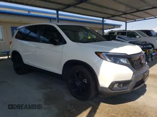 2019 Honda Passport Sport with VIN 5FNYF7H23KB005357, listed as a Copart auction lot 62219045 with 52,384 mi miles and Salvage title. Bid and sale history available at DreamBid. Image 4.