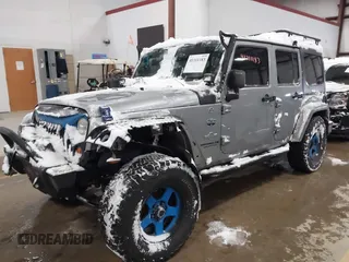 2013 Jeep Wrangler Unlimited Sport z VIN 1C4BJWDG3DL628784, wystawiony jako IAAI lot #41311183 z przebiegiem 125 118 mil mil oraz . Historia ofert i sprzedaży dostępna na DreamBid. Obrazek 2.