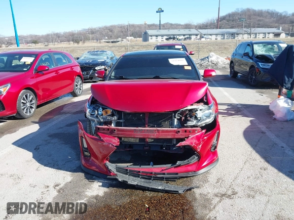 2016 Scion tC with VIN JTKJF5C77GJ026150, listed as a IAAI auction lot 41424088 with 96,370 mi miles. Bid and sale history available at carsss.com. Image 12.