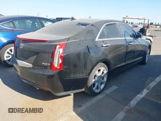 2014 Cadillac ATS Standard RWD with VIN 1G6AA5RX1E0186172, listed as a IAAI auction lot 42478726 with 131,787 mi miles and . Bid and sale history available at DreamBid. Image 4.