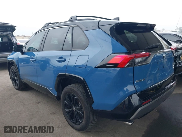 2023 Toyota RAV4 Hybrid XSE with VIN 2T3E6RFV4PW039496, listed as a IAAI auction lot 42488695 with 13,533 mi miles and . Bid and sale history available at DreamBid. Image 3.