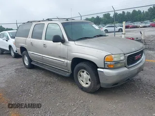 2004 GMC Yukon XL SLT z VIN 3GKFK16Z94G129005, wystawiony jako IAAI lot #42506045 z przebiegiem 309 223 mil mil oraz . Historia ofert i sprzedaży dostępna na DreamBid. Obrazek 1.
