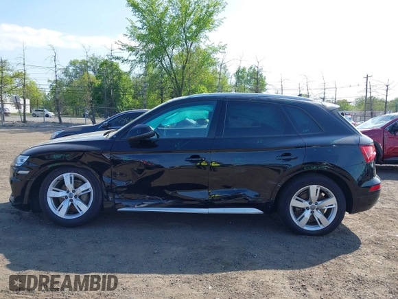 2018 Audi Q5 Premium with VIN WA1ANAFY4J2003668, listed as a IAAI auction lot 42167687 with 140,548 mi miles and . Bid and sale history available at DreamBid. Image 14.