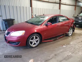 2009 Pontiac G6 GT 1SB z VIN 1G2ZK57K694233946, wystawiony jako Copart lot #82671664 z przebiegiem 197 723 mil mil oraz Szkoda całkowita • Salvage title. Historia ofert i sprzedaży dostępna na DreamBid. Obrazek 1.