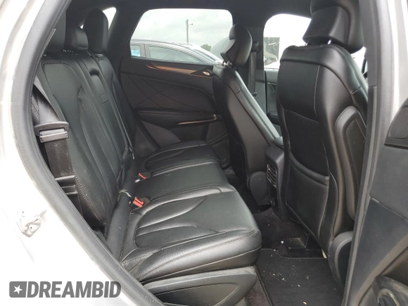 2018 Lincoln MKC Premiere z VIN 5LMCJ1C9XJUL07396, wystawiony jako Copart lot #54317485 z przebiegiem 185 589 mil mil oraz Szkoda całkowita • Salvage title. Historia ofert i sprzedaży dostępna na DreamBid. Obrazek 11.