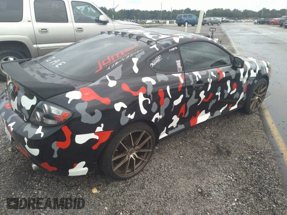 2008 Hyundai Tiburon GT z VIN KMHHN66F58U262230, wystawiony jako IAAI lot #33619963 z przebiegiem 150 708 mil mil oraz . Historia ofert i sprzedaży dostępna na DreamBid. Obrazek 4.