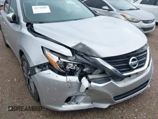 2016 Nissan Altima SV with VIN 1N4AL3AP6GC256621, listed as a IAAI auction lot 41290505 with 63,336 mi miles and . Bid and sale history available at DreamBid. Image 6.