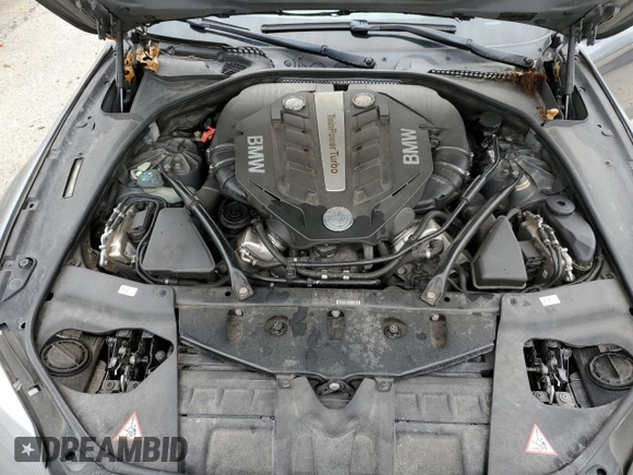 2013 BMW 6 Series 650i xDrive z VIN WBAYM1C53DDZ02397, wystawiony jako Copart lot #48872655 z przebiegiem Nie podano mil oraz Szkoda całkowita • Salvage title. Historia ofert i sprzedaży dostępna na DreamBid. Obrazek 11.