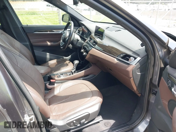 2017 BMW X1 xDrive28i with VIN WBXHT3Z38H4A55086, listed as a IAAI auction lot 42459276 with 101,907 mi miles and . Bid and sale history available at DreamBid. Image 5.