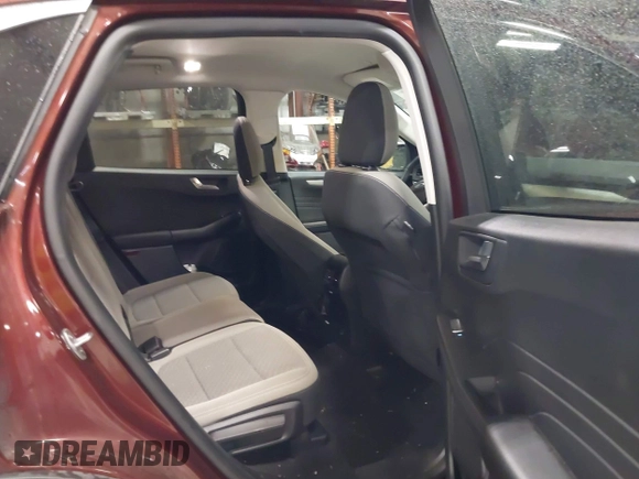 2021 Ford Escape SE with VIN 1FMCU9G69MUA91893, listed as a IAAI auction lot 42313453 with 71,278 mi miles and . Bid and sale history available at DreamBid. Image 8.