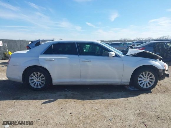 2012 Chrysler 300 with VIN 2C3CCAAG9CH173316, listed as a IAAI auction lot 41342291 with 187,080 mi miles. Bid and sale history available at carsss.com. Image 13.