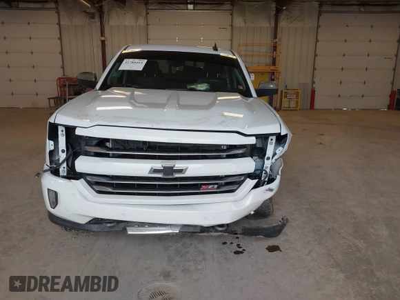 2016 Chevrolet Silverado 1500 LTZ with VIN 1GCVKSECXGZ329535, listed as a IAAI auction lot 41780464 with 117,901 mi miles and . Bid and sale history available at DreamBid. Image 6.
