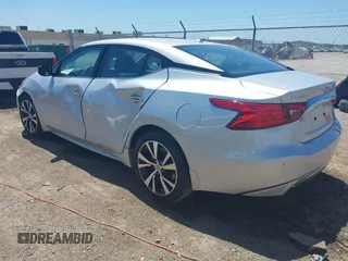2016 Nissan Maxima SV z VIN 1N4AA6AP4GC434730, wystawiony jako IAAI lot #42231308 z przebiegiem 42 239 mil mil oraz . Historia ofert i sprzedaży dostępna na DreamBid. Obrazek 3.