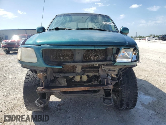 1997 Ford F-150 XL with VIN 1FTDX1861VKB19764, listed as a Copart auction lot 50773885 with 231,005 mi miles and Salvage Title. Bid and sale history available at carsss.com. Image 5.