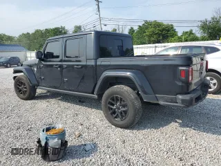 2023 Jeep Gladiator Sport S with VIN 1C6HJTAG7PL517812, listed as a Copart auction lot 60200015 with 38,793 mi miles and Clean title. Bid and sale history available at DreamBid. Image 2.