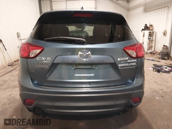 2015 Mazda CX-5 Grand Touring with VIN JM3KE4DY7F0504398, listed as a IAAI auction lot 41698365 with 122,121 mi miles. Bid and sale history available at carsss.com. Image 16.