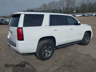 2017 Chevrolet Tahoe LT with VIN 1GNSKBKCXHR350028, listed as a IAAI auction lot 41684954 with 117,261 mi miles and . Bid and sale history available at DreamBid. Image 4.