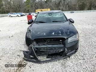 2014 Audi A8 3.0T z VIN WAURGAFD2EN002567, wystawiony jako Copart lot #48188395 z przebiegiem 159 477 mil mil oraz Szkody całkowita. Historia ofert i sprzedaży dostępna na DreamBid. Obrazek 13.