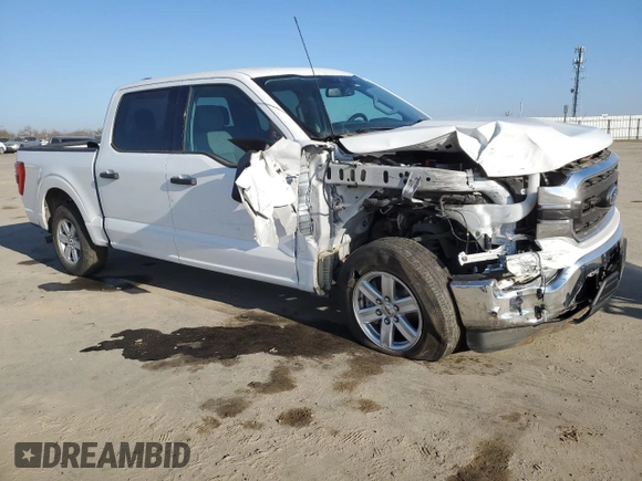 2021 Ford F-150 XL with VIN 1FTEW1CP8MFD11312, listed as a Copart auction lot 88754605 with 142,224 mi miles and Salvage title. Bid and sale history available at DreamBid. Image 4.