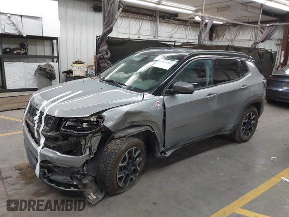 2020 Jeep Compass Trailhawk with VIN 3C4NJDDB7LT203447, listed as a IAAI auction lot 42637452 with 113,896 mi miles and . Bid and sale history available at DreamBid. Image 2.