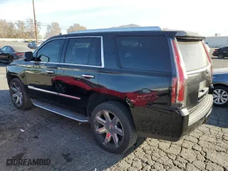 2016 Cadillac Escalade Luxury Collection with VIN 1GYS3BKJ2GR159734, listed as a Copart auction lot 86914534 with 153,717 mi miles and Salvage Title. Bid and sale history available at carsss.com. Image 2.