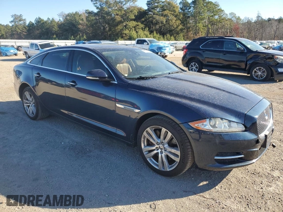 2013 Jaguar XJ with VIN SAJWA2G16DLV50973, listed as a Copart auction lot 82555074 with 148,956 mi miles and Salvage Title. Bid and sale history available at carsss.com. Image 4.