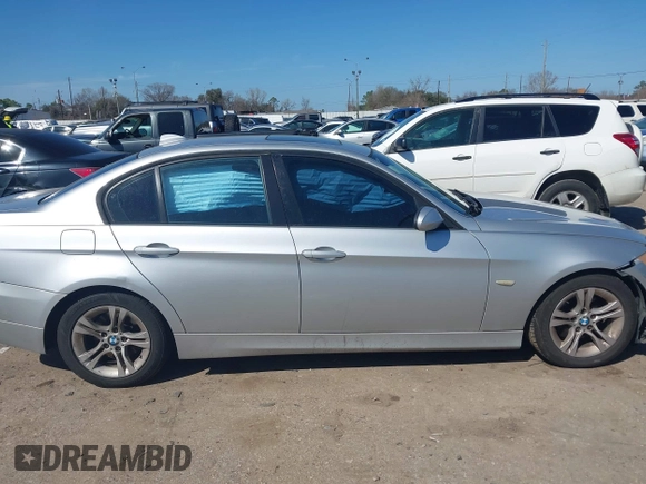2008 BMW 3 Series 328i with VIN WBAVA37598NL56755, listed as a IAAI auction lot 41668770 with 170,122 mi miles. Bid and sale history available at carsss.com. Image 12.