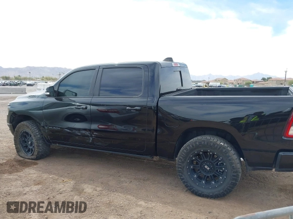 2019 Ram 1500 Big Horn/Lone Star with VIN 1C6SRFFT0KN751969, listed as a IAAI auction lot 41731290 with 127,111 mi miles. Bid and sale history available at carsss.com. Image 14.
