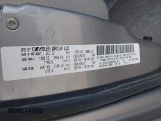 2013 Chrysler Town & Country Touring-L with VIN 2C4RC1CG6DR650928, listed as a IAAI auction lot 41740639 with 198,678 mi miles. Bid and sale history available at carsss.com. Image 9.