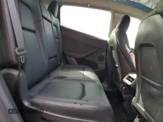 2024 Tesla Model Y Long Range z VIN 7SAYGAEE1RF107617, wystawiony jako Copart lot #48224405 z przebiegiem 10 637 mil mil oraz Szkoda całkowita • Salvage title. Historia ofert i sprzedaży dostępna na DreamBid. Obrazek 12.