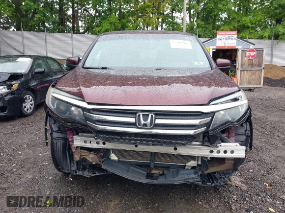2016 Honda Pilot EX-L with VIN 5FNYF6H5XGB007876, listed as a IAAI auction lot 42366901 with 128,580 mi miles and . Bid and sale history available at DreamBid. Image 12.