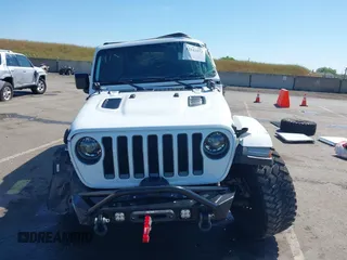 2018 Jeep Wrangler Unlimited Rubicon with VIN 1C4HJXFGXJW110629, listed as a IAAI auction lot 42141572 with 65,973 mi miles and . Bid and sale history available at DreamBid. Image 12.