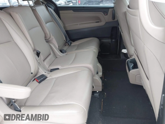 2023 Honda Odyssey Touring with VIN 5FNRL6H84PB048916, listed as a IAAI auction lot 41325052 with 50,290 mi miles and . Bid and sale history available at DreamBid. Image 8.