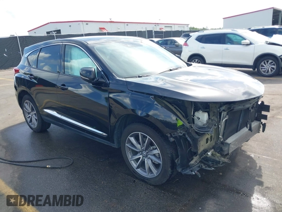2020 Acura RDX w/Technology Pkg with VIN 5J8TC1H57LL002097, listed as a IAAI auction lot 41957752 with 60,945 mi miles. Bid and sale history available at carsss.com. Image 1.