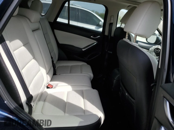 2016 Mazda CX-5 Grand Touring with VIN JM3KE4DYXG0844002, listed as a Copart auction lot 52712035 with 81,042 mi miles and Salvage Title. Bid and sale history available at DreamBid. Image 11.
