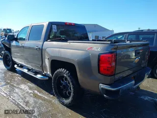 2015 Chevrolet Silverado 1500 LT with VIN 3GCUKREC9FG517787, listed as a IAAI auction lot 41400803 with 254,489 mi miles. Bid and sale history available at carsss.com. Image 3.