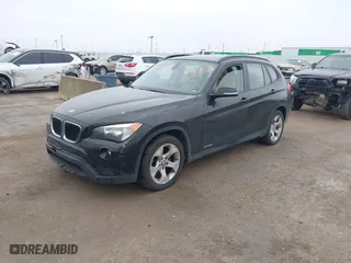 2014 BMW X1 sDrive28i with VIN WBAVM1C58EVW48622, listed as a IAAI auction lot 41531855 with 90,102 mi miles. Bid and sale history available at carsss.com. Image 2.