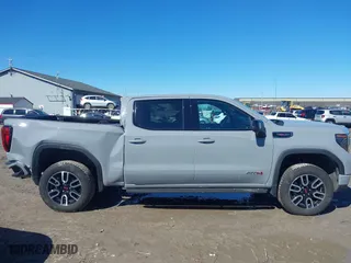 2025 GMC Sierra 1500 AT4 with VIN 3GTUUEELXSG138620, listed as a IAAI auction lot 41805574 with 13,056 mi miles. Bid and sale history available at carsss.com. Image 13.