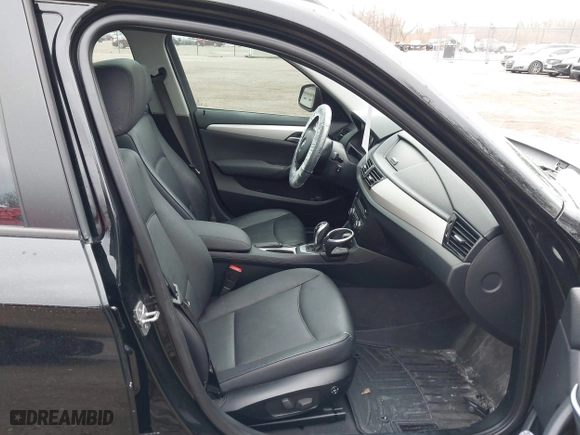 2015 BMW X1 xDrive28i with VIN WBAVL1C57FVY28856, listed as a IAAI auction lot 41695075 with 96,264 mi miles. Bid and sale history available at carsss.com. Image 5.