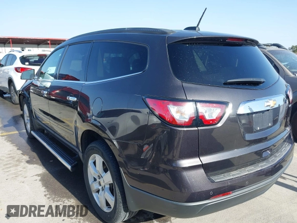 2016 Chevrolet Traverse LT with VIN 1GNKRGKD4GJ326001, listed as a IAAI auction lot 41826843 with 87,274 mi miles. Bid and sale history available at carsss.com. Image 3.