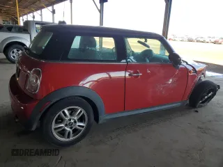 2012 MINI Hardtop with VIN WMWSU3C5XCT261853, listed as a Copart auction lot 49980285 with 110,638 mi miles and Salvage Title. Bid and sale history available at DreamBid. Image 3.