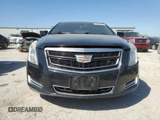 2016 Cadillac XTS Luxury Collection with VIN 2G61N5S37G9197536, listed as a Copart auction lot 52705785 with 143,434 mi miles and Salvage title. Bid and sale history available at DreamBid. Image 5.