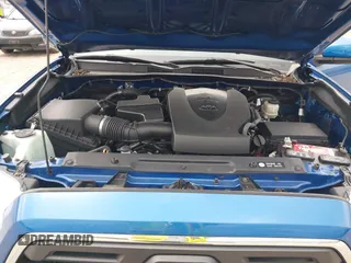 2018 Toyota Tacoma SR5 with VIN 3TMAZ5CNXJM069212, listed as a IAAI auction lot 42010564 with 73,825 mi miles and . Bid and sale history available at DreamBid. Image 10.