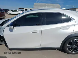 2021 Lexus UX with VIN JTHX3JBH5M2034944, listed as a IAAI auction lot 41068335 with 53,522 mi miles. Bid and sale history available at carsss.com. Image 14.