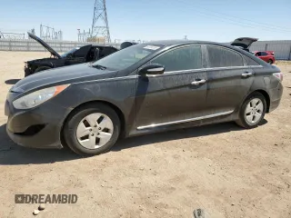 2012 Hyundai Sonata Hybrid z VIN KMHEC4A41CA034982, wystawiony jako Copart lot #60334055 z przebiegiem 140 786 mil mil oraz Czysty tytuł • Clean title. Historia ofert i sprzedaży dostępna na DreamBid. Obrazek 1.