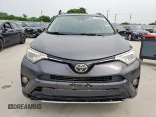 2016 Toyota RAV4 Limited with VIN JTMYFREVXGJ068353, listed as a Copart auction lot 57449565 with 236,882 mi miles and Clean title. Bid and sale history available at DreamBid. Image 5.