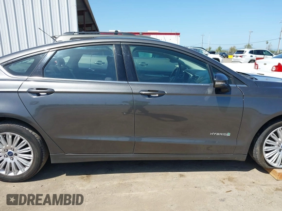 2016 Ford Fusion SE Hybrid with VIN 3FA6P0LU9GR405097, listed as a IAAI auction lot 42000535 with 58,293 mi miles. Bid and sale history available at carsss.com. Image 13.