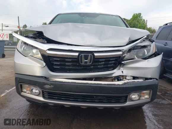 2019 Honda Ridgeline RTL-E with VIN 5FPYK3F72KB026100, listed as a IAAI auction lot 42205910 with 78,359 mi miles and . Bid and sale history available at DreamBid. Image 6.